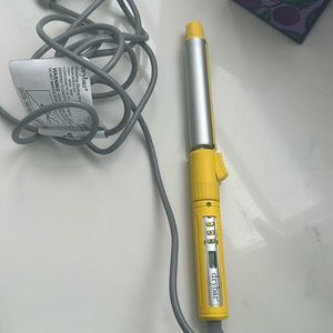 Dry bar curling iron.

Grey working condition